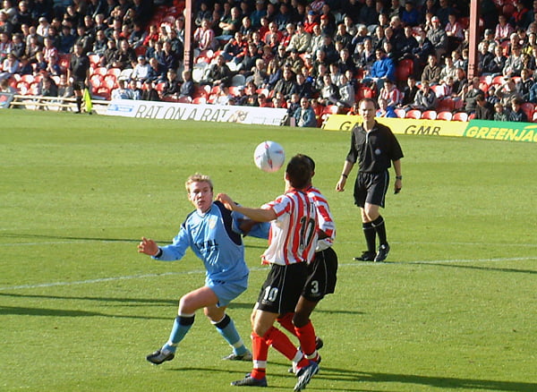 Steve McPhee in action against Brentford