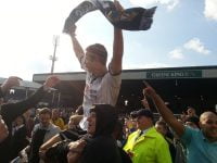 Tom Pope chaired aloft after promotion in 2013