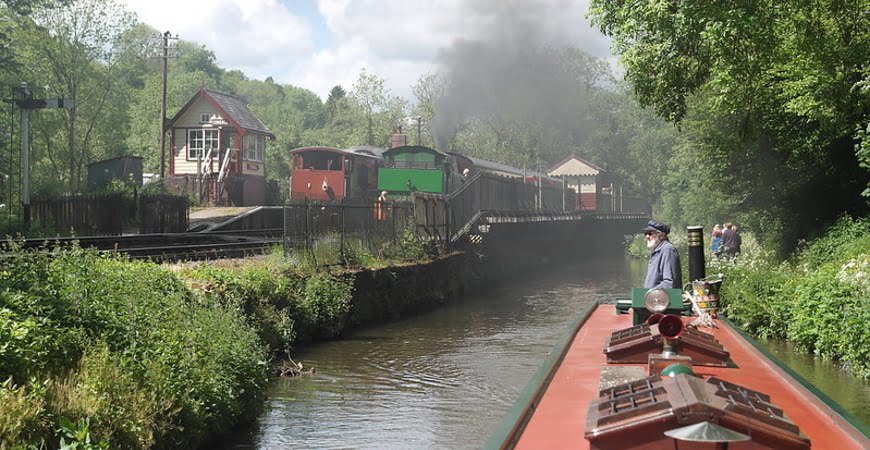 "Churnet Valley Railway taken from the Caldon Canal" by draxil is licensed under CC BY-SA 2.0