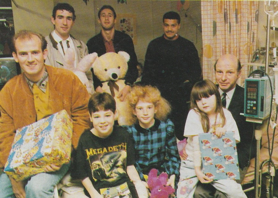 Port Vale players distribute presents at the hospital, 1990