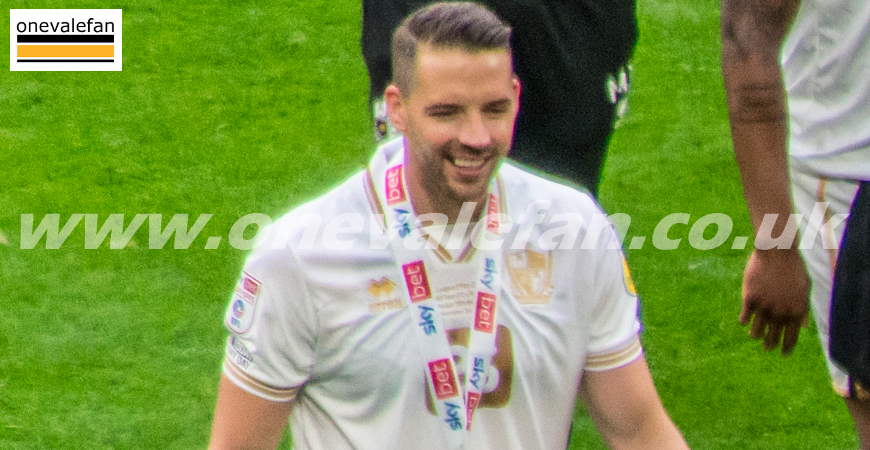Aaron Martin celebrates promotion at Wembley