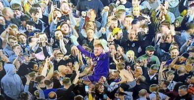 Port Vale goalkeeper Aiden Stone celebrates with fans after the play-off win over Swindon Town May 2022